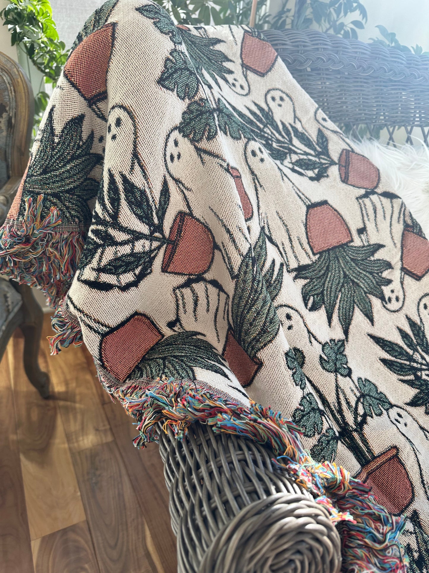 ghost woven blanket 50x60” clearance with potted plants