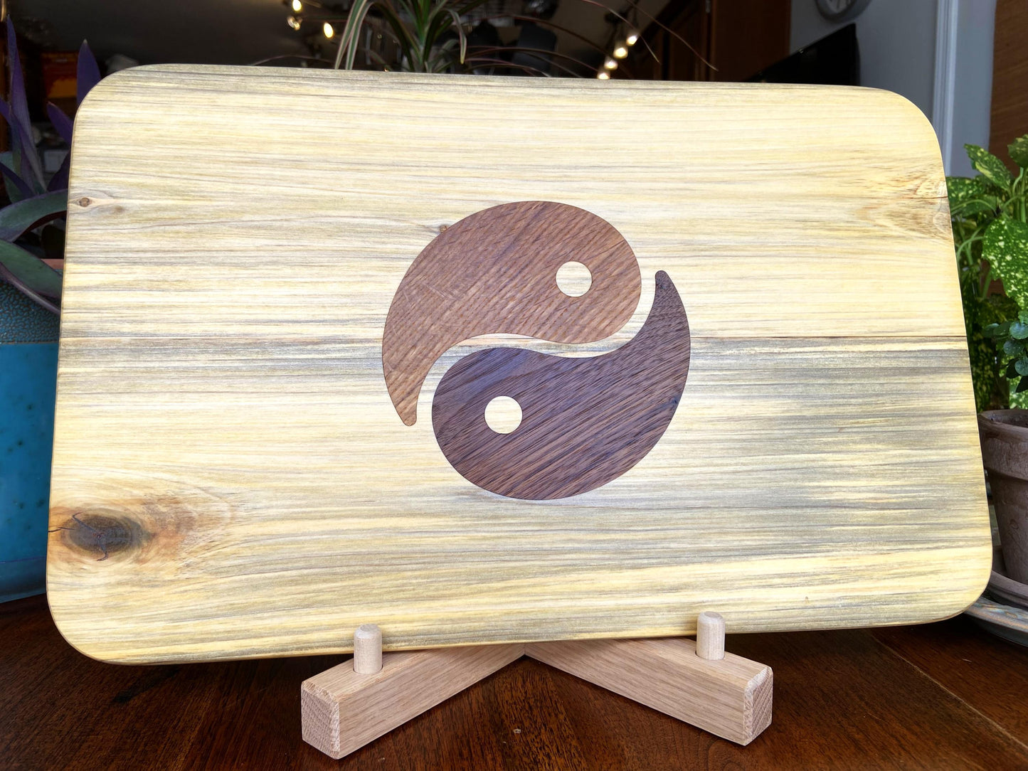 Poplar charcuterie board with Yin Yang inlay made from White Oak and Peruvian Walnut.