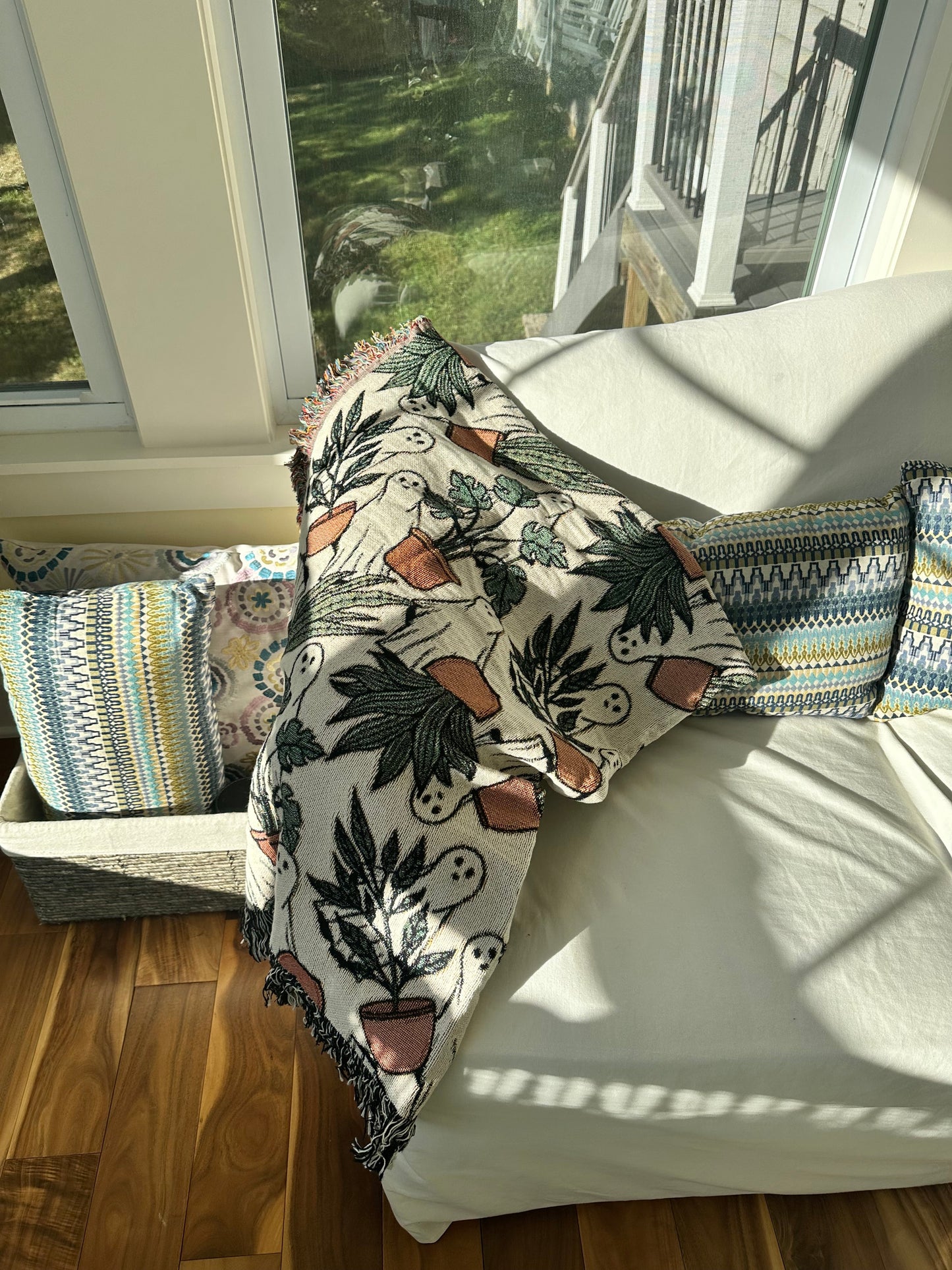 ghost woven blanket 50x60” clearance with potted plants