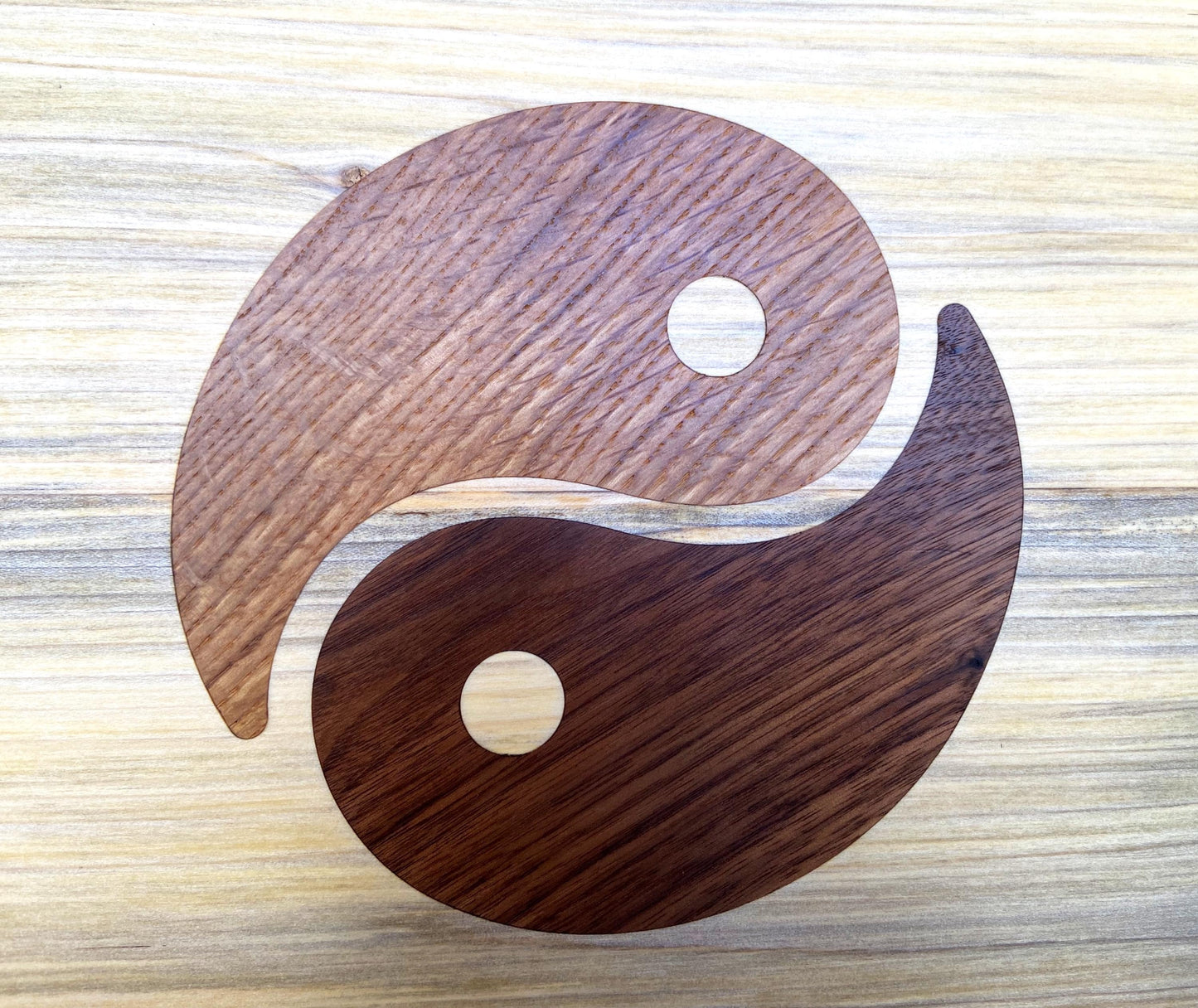 Poplar charcuterie board with Yin Yang inlay made from White Oak and Peruvian Walnut.