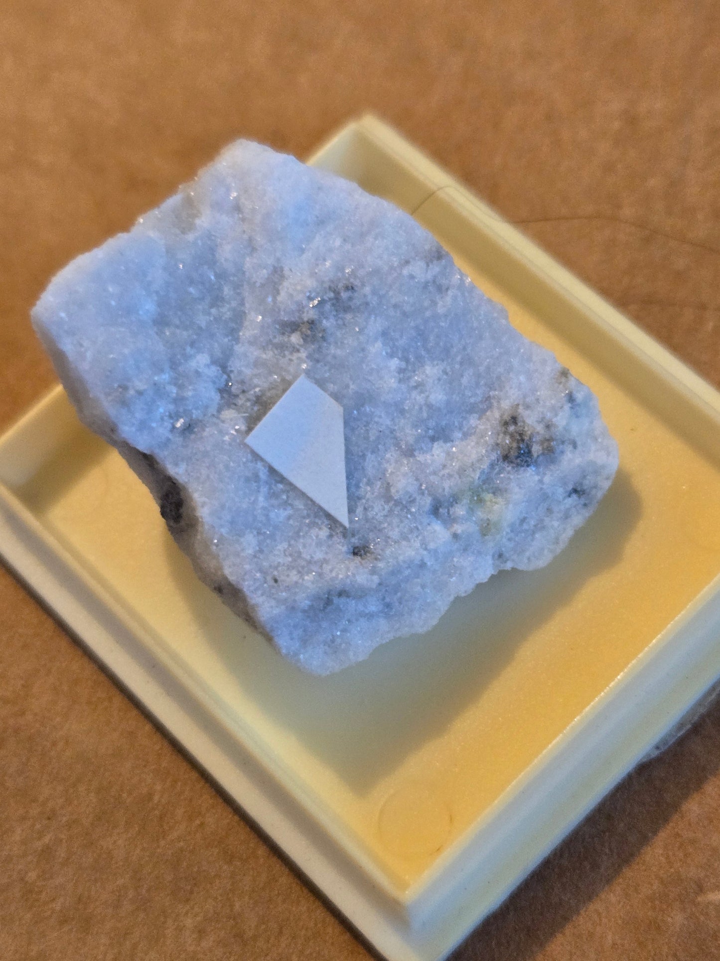 Ambrinoite