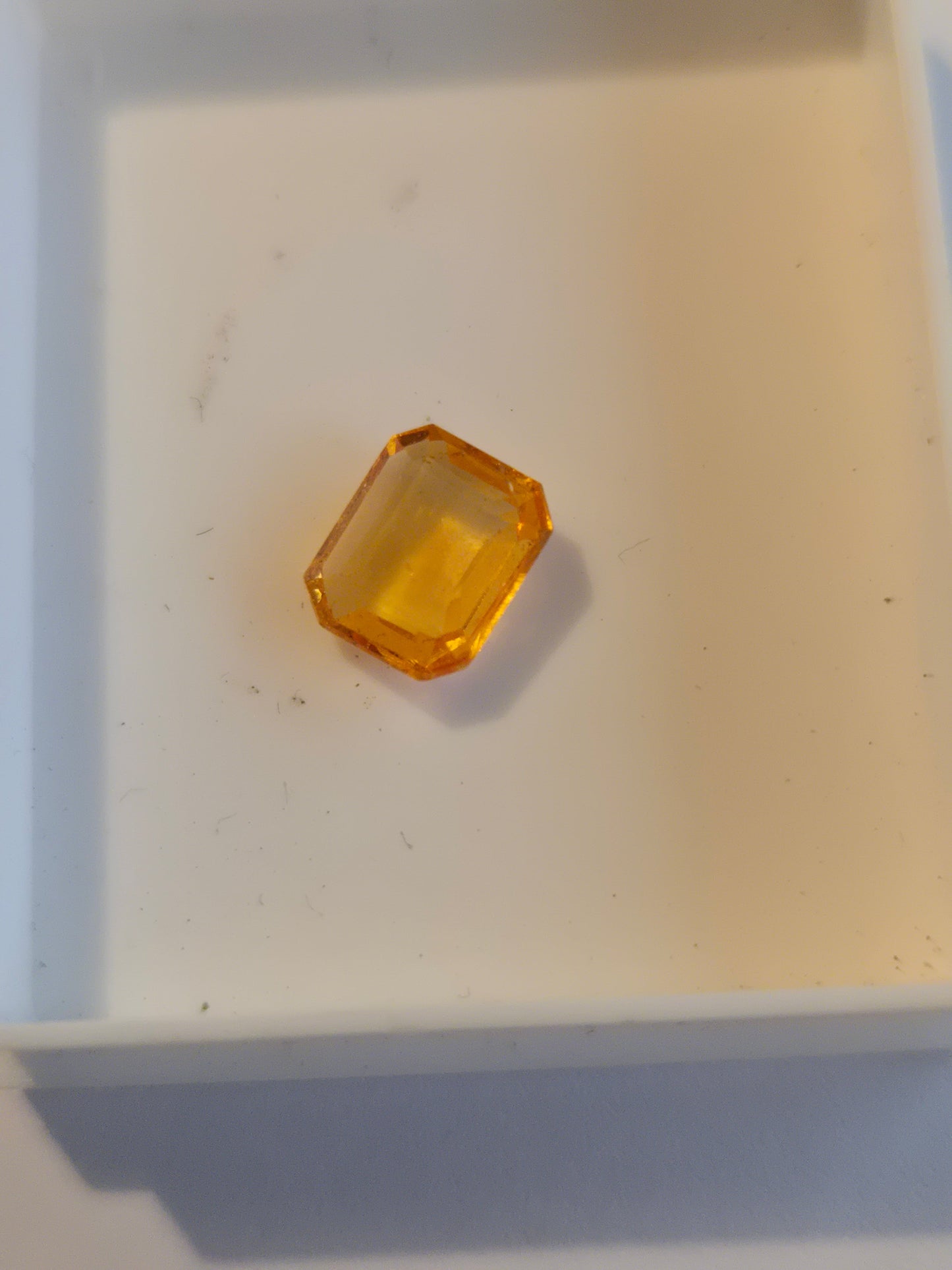 Spessartine garnet emerald cut facet
