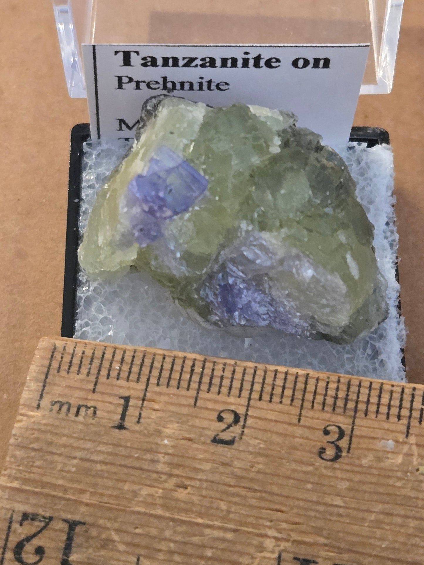 Tanzanite on green prehnite specimen