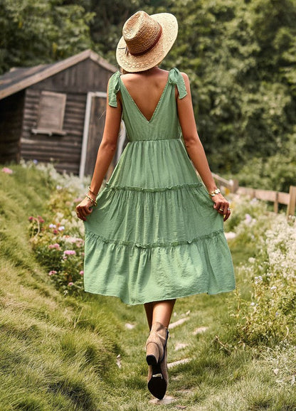 Tiered V neck dress with ties