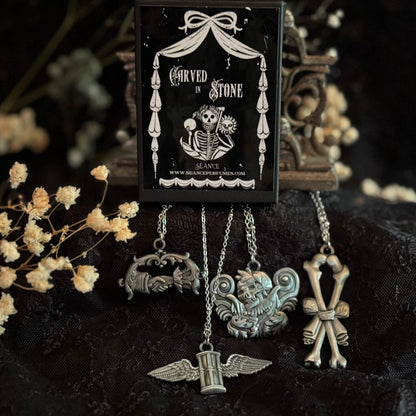 Carved In Stone- Hour Glass with Wings