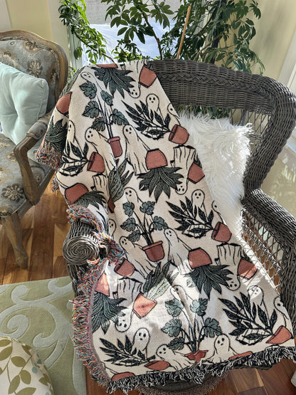 ghost woven blanket 50x60” clearance with potted plants