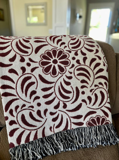 Red and beige woven blanket with Mexican Talavera design. Otomi Red And White Woven Blanket. Mexican blanket