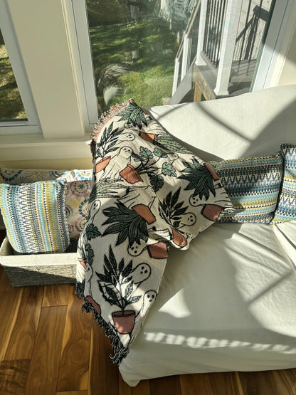 ghost woven blanket 50x60” clearance with potted plants