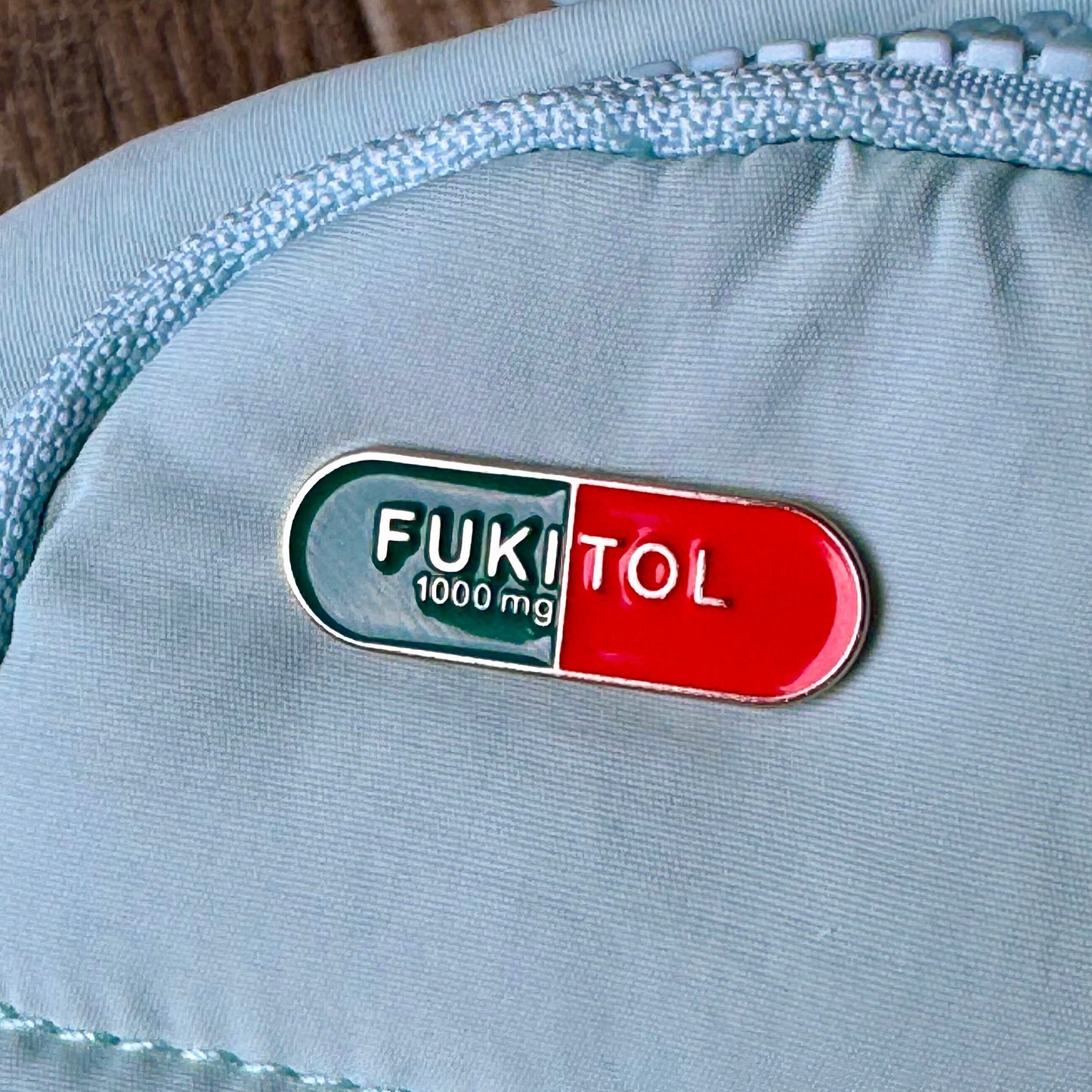 Fukitol Enamel Pin