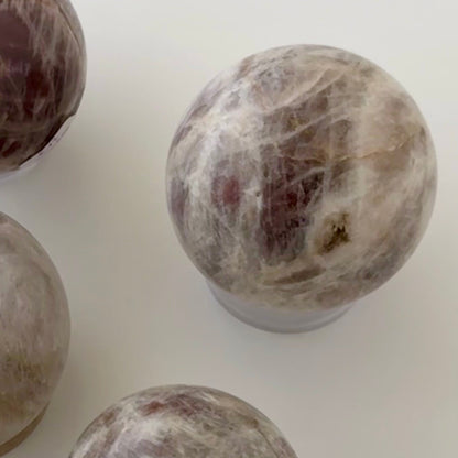 Sunstone in Moonstone Sphere