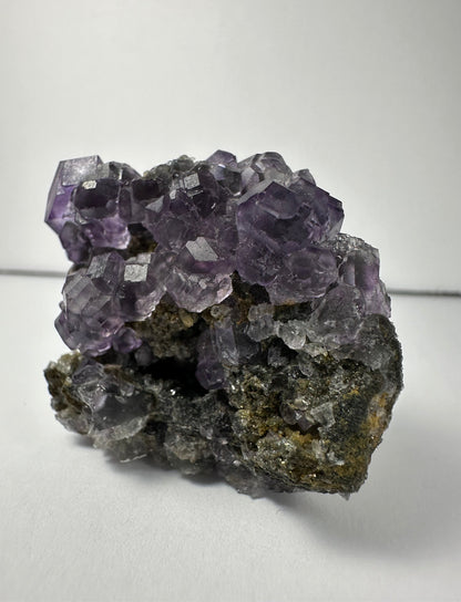 Purple Dodecahedral Fluorite with Calcite on matrix