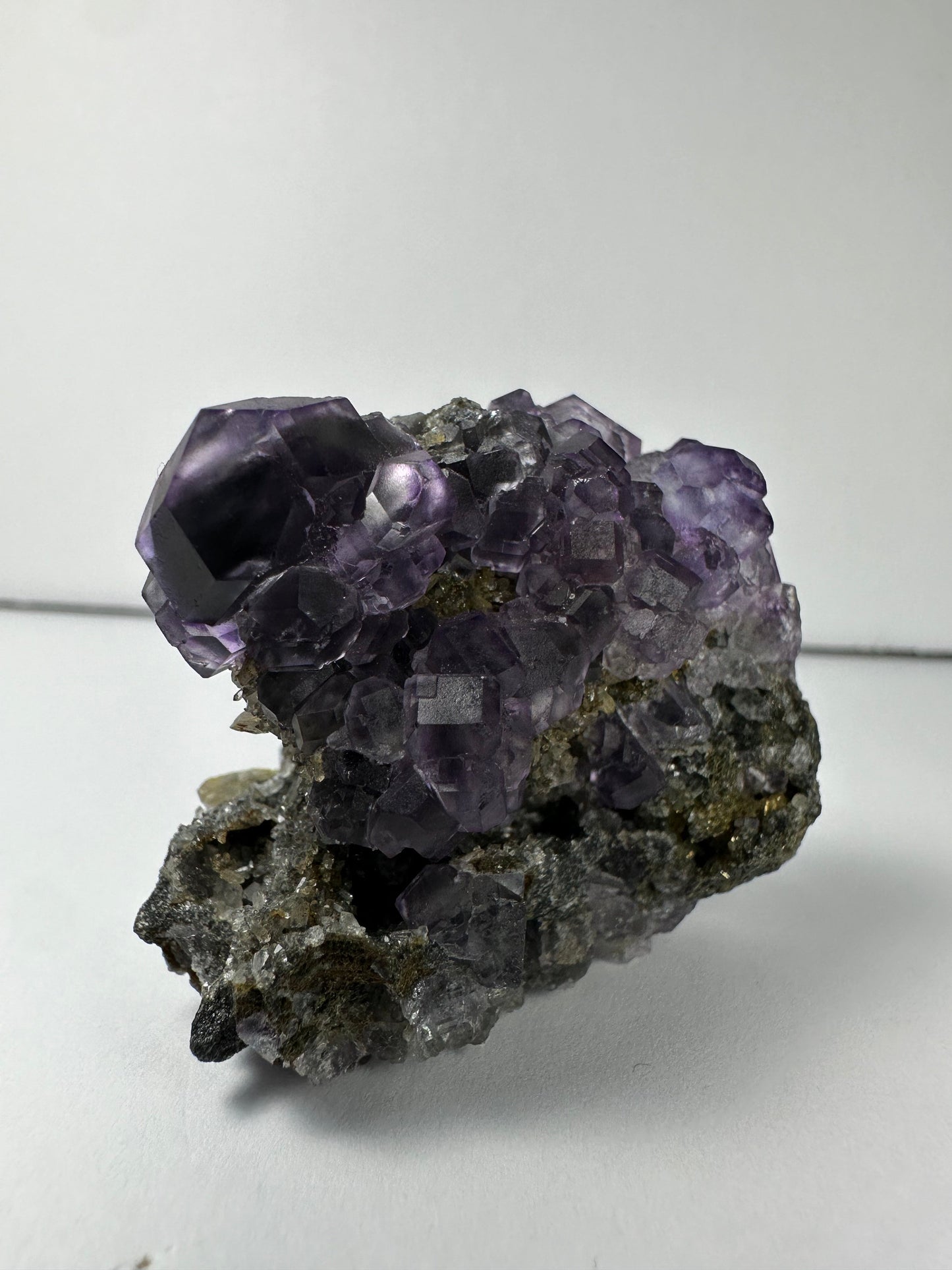 Purple Dodecahedral Fluorite with Calcite on matrix