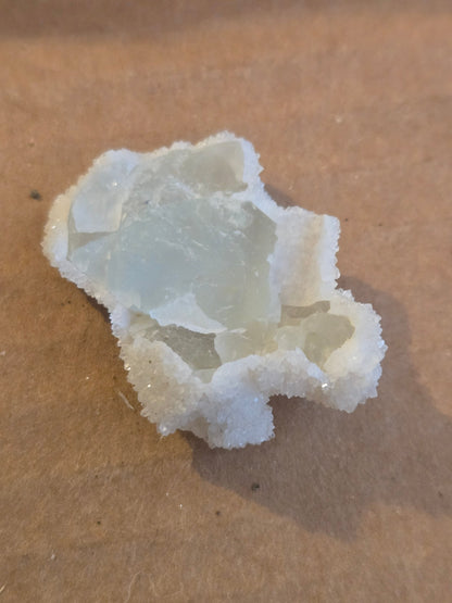 Quartz on fluorite