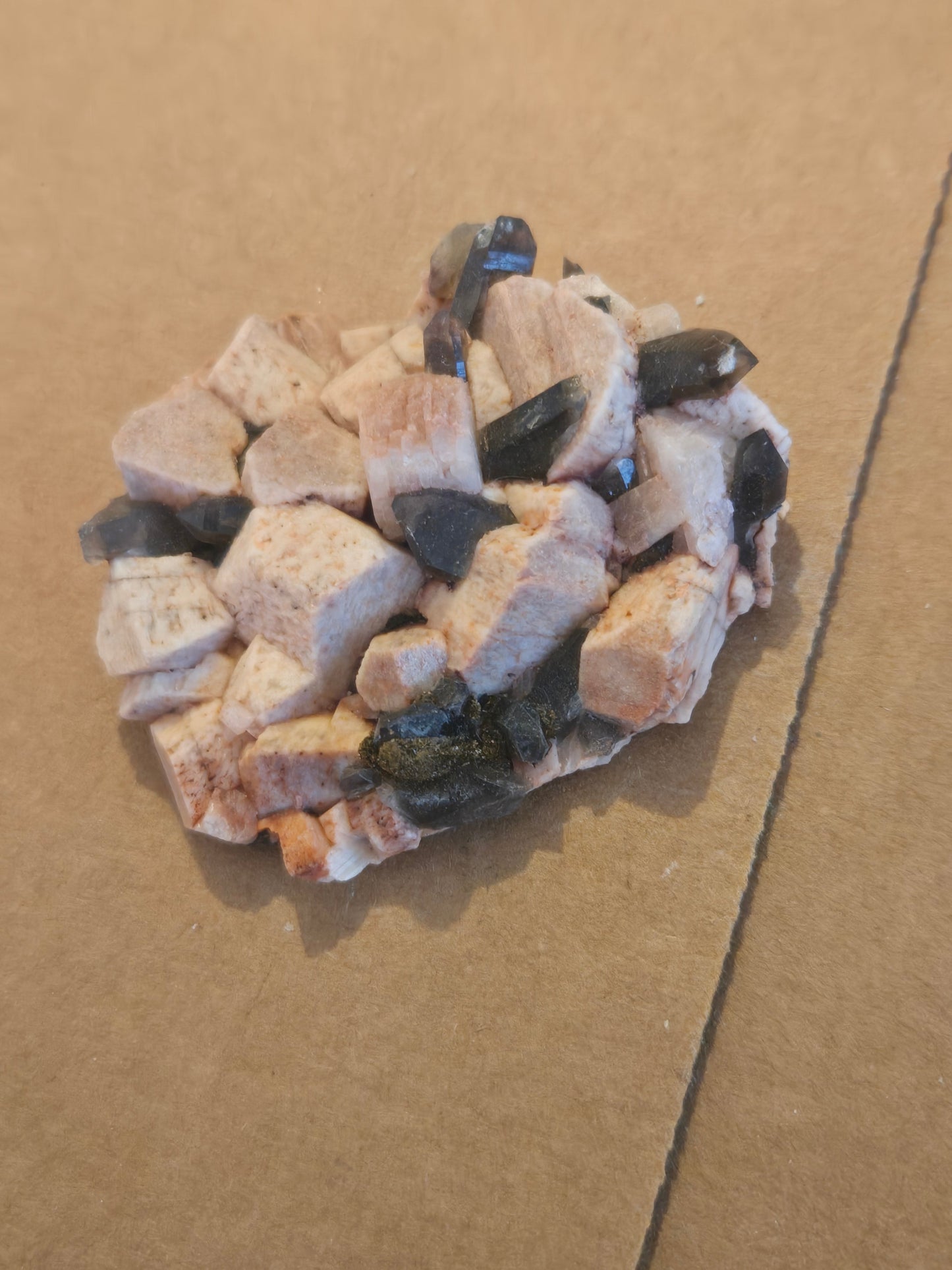 Smoky quartz on microcline