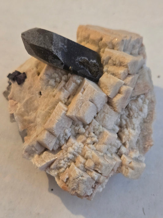 Smoky quartz on microcline