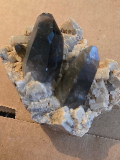 Smoky quartz on microcline