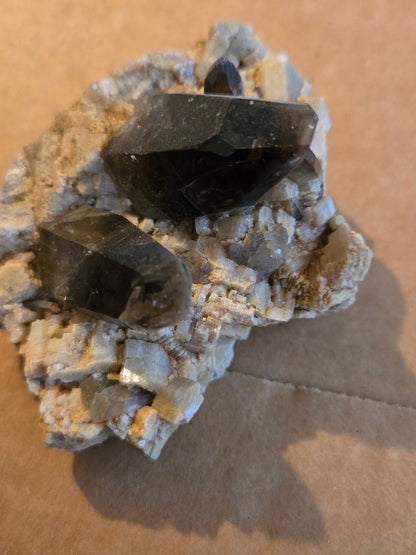 Smoky quartz on microcline