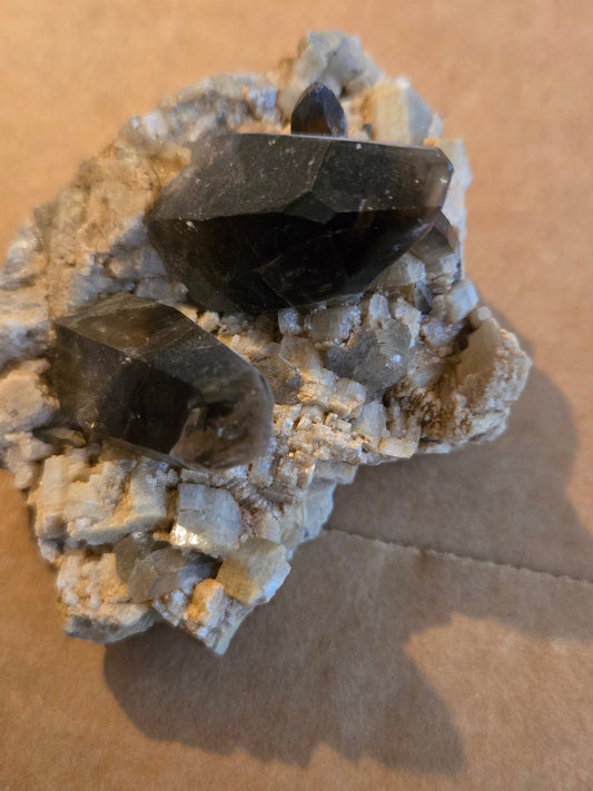 Smoky quartz on microcline