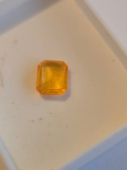 Spessartine garnet emerald cut facet
