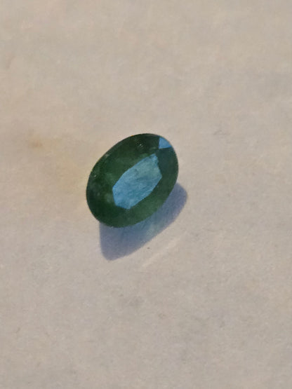 Tsavorite garnet facet