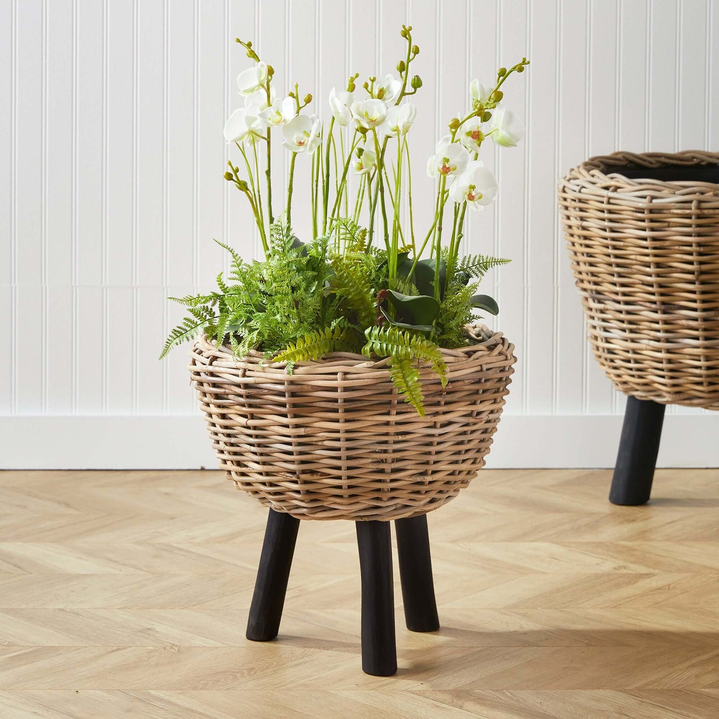 Woven Rattan Planter with Plastic Pot and Wood Legs